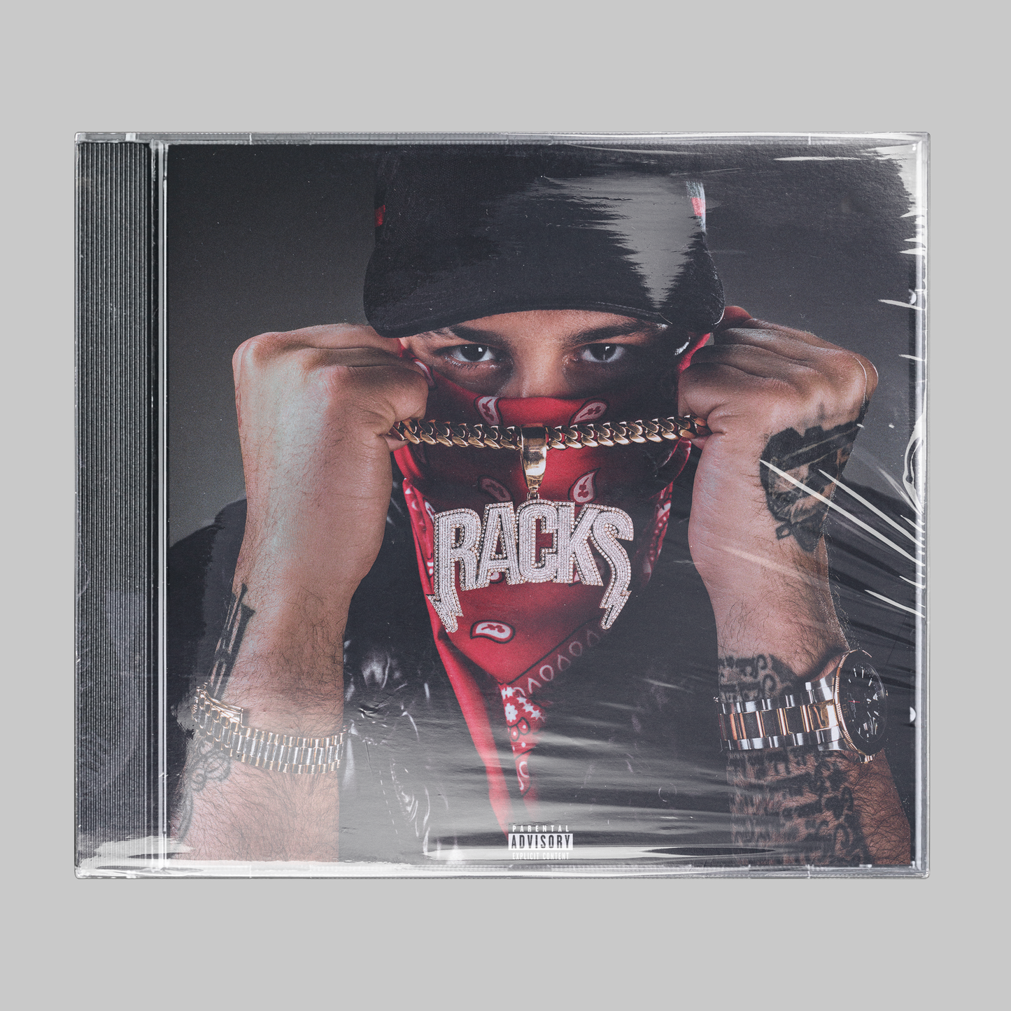 Racks Pack Ručník + CD